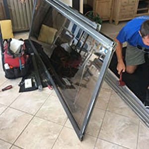 sliding glass door frame repair Quaker